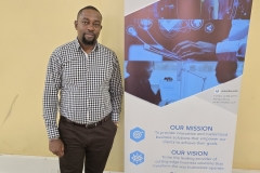 Duncan Nyale, Director posing after a successful Training
